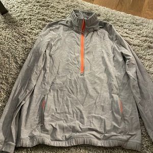 Lululemon grey half zip with orange zippers. Worn few times